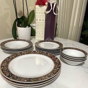 Elegant Dinnerware Set with Gold and Black Accents